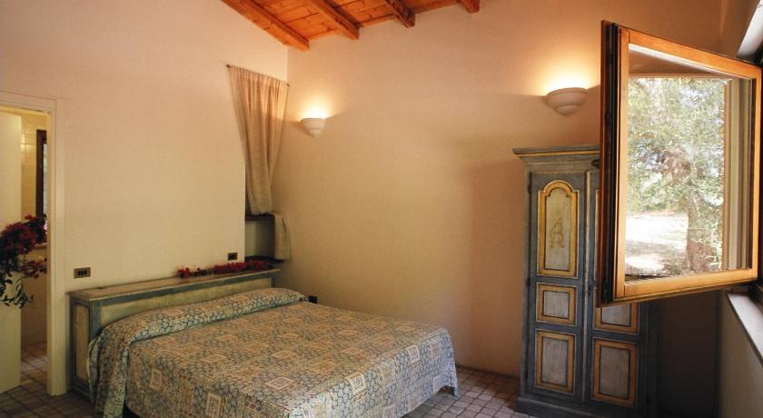 Tenuta Molino Di Mare- Ecoresort Con Villini Роді-Гарганіко Номер фото